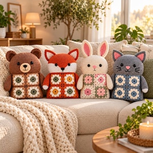 May include: Four handmade crochet plush toys shaped like a bear, a fox, a rabbit, and a cat. Each animal features a head with embroidered facial details and a body constructed from colorful granny square motifs in shades of brown, orange, white, pink, and blue.
