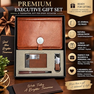 May include: A premium executive gift set in a black box containing a brown leather-look A5 journal with a silver circular clasp, a brown and silver card holder, a brown and silver keychain, and a brown ballpoint pen with silver accents.
