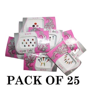 May include: A collection of Roop Pahi brand bindi packs featuring various colorful, decorative adhesive face jewels. Each pink cardboard package displays intricate silver paisley patterns and contains multiple small, shaped bindis in assorted colors.