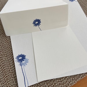 Handmade stationery set, writing paper with a blue flower hand stamped on creamy off-white writing paper, set of 30 pieces.