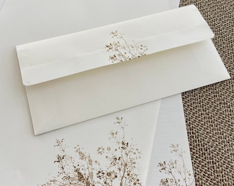 Hand made stationery set, writing paper with wild flowers stamped on creamy off-white writing paper, set of 30 pieces.