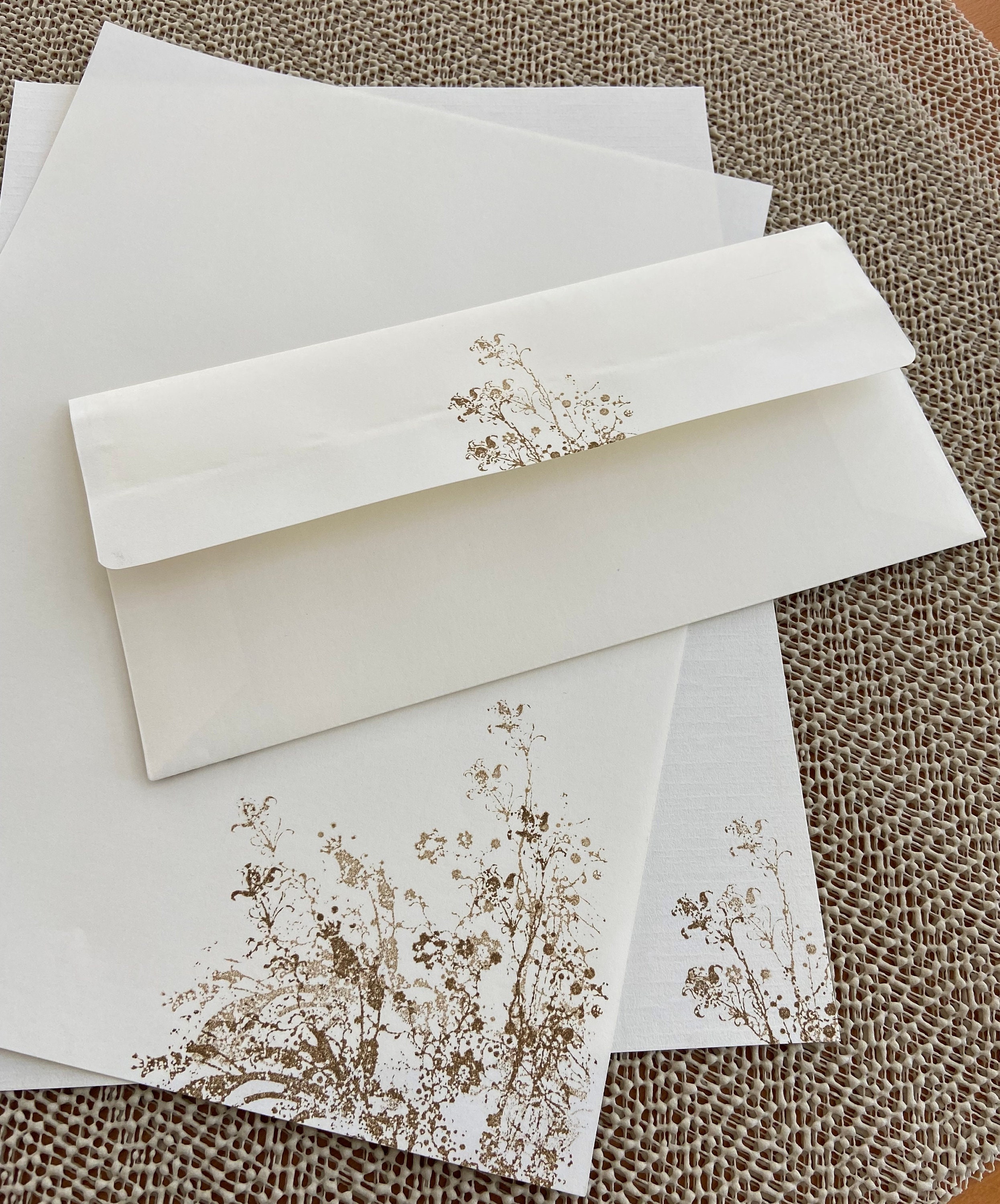 Hand made stationery set, writing paper with wild flowers stamped on creamy off-white writing paper, set of 30 pieces.