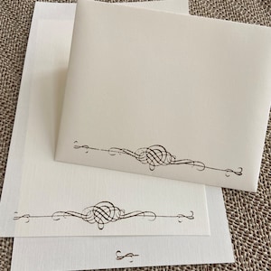 Handmade stationery set, writing paper with a vintage scroll stamped on creamy off-white writing paper, set of 30 pieces.