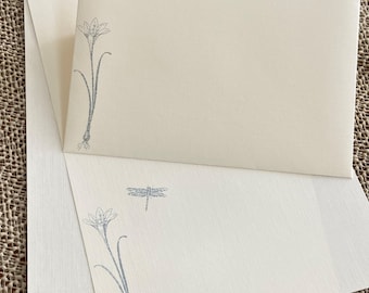 Handmade stationery set, writing paper with a blue lily and dragonfly hand stamped on creamy off-white writing paper, set of 30 pieces.