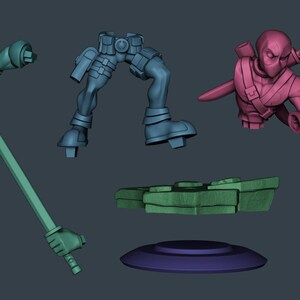 May include: A 3D digital model kit of a masked character featuring a pink torso with a sword on the back, blue legs with a utility belt, a separate arm, a sword held in a hand, and a green rocky base with a circular purple platform underneath.