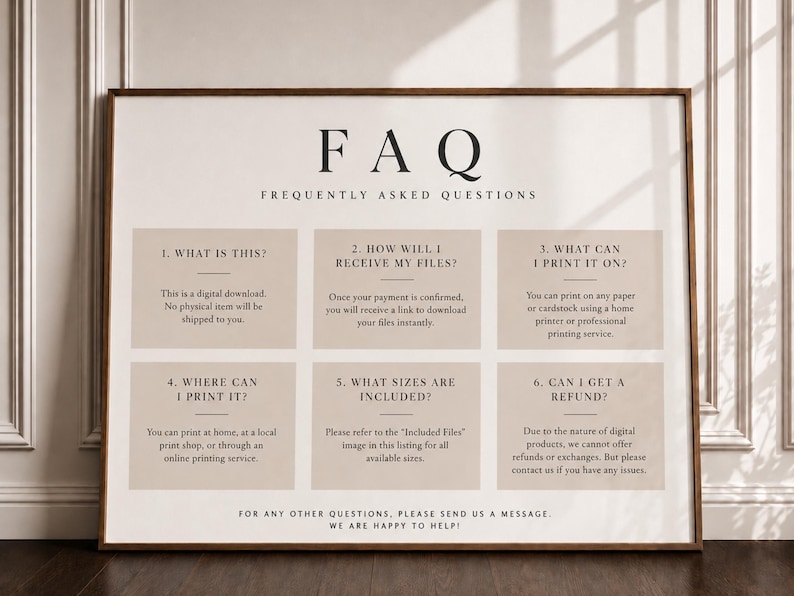May include: A rectangular sign with a white background and a thin brown frame. The text FAQ FREQUENTLY ASKED QUESTIONS appears at the top. Below are six beige boxes containing numbered questions and answers regarding digital download policies.