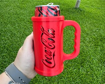 Reusable cup for Coca-Cola and other carbonated drinks.