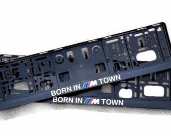 Cornici portatarga BMW Born in M Town, standard UE (set da 2), design premium