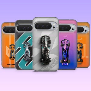 May include: Five smartphone cases featuring Formula 1 race car designs. From left to right: an orange McLaren case, a teal and black case, a silver Mercedes-AMG F1 Team case, a pink and blue Alpine case, and an orange McLaren case with text.