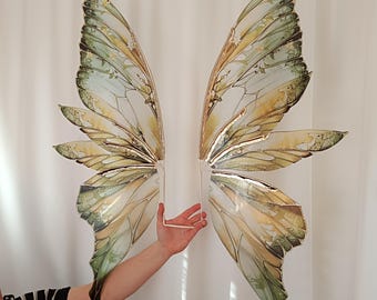 Large Woodland  Fae Wings  for Adults on a white frame with gold trim