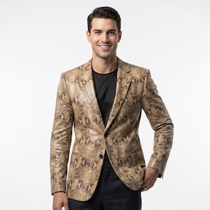 May include: A tan and brown snakeskin patterned blazer featuring a notched lapel, two front buttons, and long sleeves. The jacket is worn over a solid black shirt and dark trousers, showcasing a structured fit with a classic tailored silhouette.
