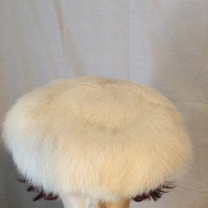 Women&#39;s vintage white rabbit fur stylish hat.