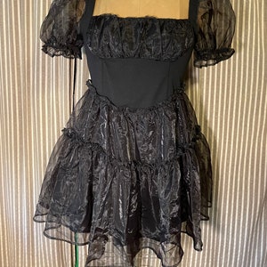 Black poly dress with sheer puffy sleeves and ruffles