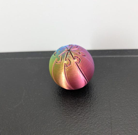 3D Printed Twisty Ball Fidget with Shiny Silk Rainbow Filament