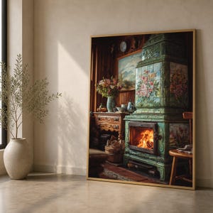 May include: A framed wall art print depicting a tall, ornate green tiled stove with floral patterns and a burning fire in the hearth. The scene includes a wooden table, a vase of flowers, and a landscape painting, all set within a rustic room.