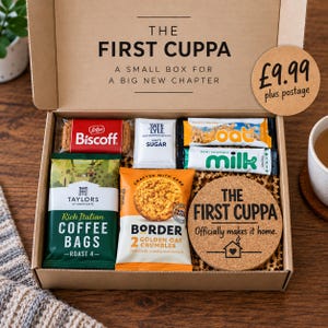 May include: A cardboard gift box labelled The First Cuppa containing a Lotus Biscoff biscuit, Tate & Lyle white sugar, oat and milk sachets, Taylors of Harrogate coffee bags, Border Golden Oat Crumbles, and a round cork coaster with printed text.