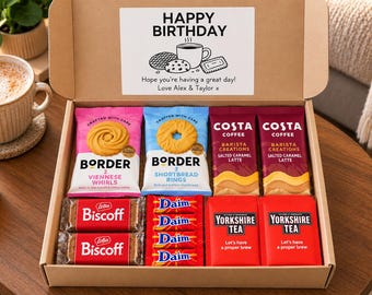 May include: A cardboard gift box containing Border Viennese Whirls, Border Shortbread Rings, two Costa Coffee Salted Caramel Latte sachets, two Lotus Biscoff packs, four Daim bars, and two Yorkshire Tea bags, with a Happy Birthday label inside.