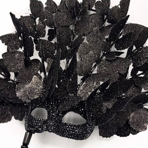 Swarm ~ Black Glitter Butterfies Handled Masquerade Mask