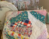 Handmade cosmetic bag from vintage quilt