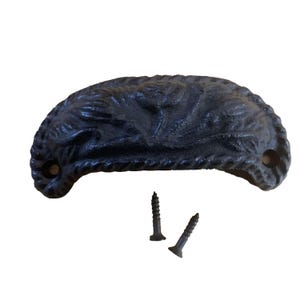 May include: Black cast iron drawer pull with a rope design. The pull comes with two screws.