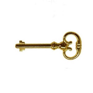 May include: A gold-colored skeleton key with a decorative, ornate head.