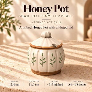 May include: A lobed honey pot with a fluted lid, featuring a speckled cream finish and green leaf motifs. Text reads: Honey Pot SLAB POTTERY TEMPLATE, INTERMEDIATE SKILL, A Lobed Honey Pot with a Fluted Lid, Height 12.4 cm, Diameter 11.0 cm, Holds 317 ml fired, Templates A4 + US Letter.