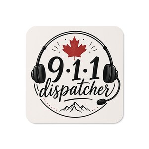 May include: A square coaster with a white background featuring a black graphic of headphones encircling the text 9.1.1 dispatcher. A red maple leaf is positioned above the text, and a black mountain range silhouette is located below the text.