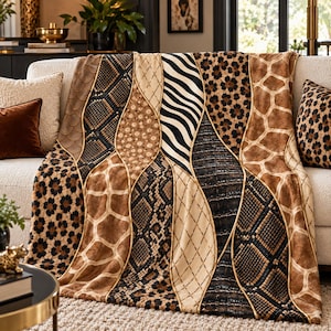 May include: A rectangular throw blanket featuring a patchwork design of various animal prints and textures, including leopard spots, giraffe patterns, zebra stripes, and snakeskin motifs, separated by wavy gold-colored piping lines.