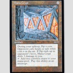 May include: A Mana Crypt trading card featuring a brown border and an illustration of a stone chamber with glowing orange triangular panels. The card text includes the name, a zero cost symbol, the type Artifact, and rules for coin flipping.