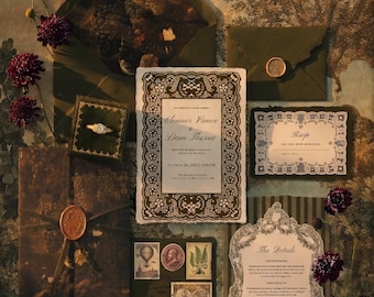 May include: A wedding stationery set featuring dark olive green envelopes with wax seals, a ring in a velvet box, and cream-colored cards with intricate lace-style borders. The text includes Eleanor Vance and Liam Thorne, RSVP, and The Details.