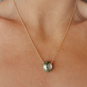 Round ceramic light green bead, on gold stainless steel chain