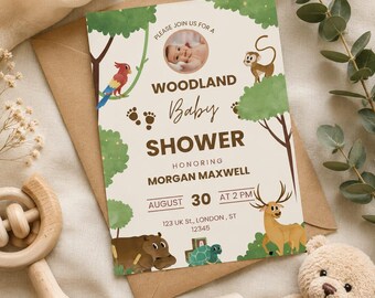 May include: A rectangular baby shower invitation card featuring a cream background with watercolor illustrations of a parrot, monkey, deer, hippo, and turtle. The text reads: PLEASE JOIN US FOR A WOODLAND Baby SHOWER HONORING MORGAN MAXWELL AUGUST 30 AT 2 PM 123 UK St., LONDON, ST 12345.