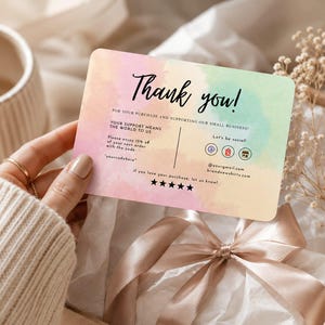 May include: A rectangular thank you card with rounded corners featuring a pastel watercolor background in pink, yellow, and green. The text reads Thank you! For your purchase and supporting our small business, your support means the world to us.
