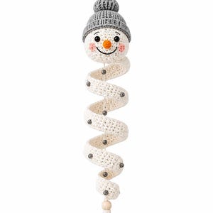 Crochet spiral snowman holiday ornament isolated on clean white background