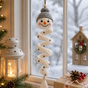 Festive Christmas home decor featuring handmade crochet spiral snowman hanging decoration
