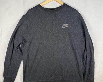 Sudadera Nike gris oscuro jaspeado con cuello redondo, estilo Jumpman, talla grande.