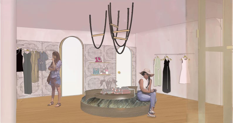 Op de afbeelding: Een interieurweergave van een winkel met een gebogen groen displayplatform, twee boogdeuren en kledingrekken met jurken. Twee zwarte sculpturale lichtarmaturen hangen aan het plafond. De muren zijn voorzien van een behang met patroon.
