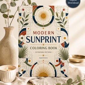 以下が含まれることがあります： AngelArtGaleryによる30種類の印刷可能なパターンを収録した「Modern Sunprint Coloring Book」というタイトルの塗り絵。表紙はクリーム色の背景で、幾何学的な太陽のモチーフ、植物の葉のイラスト、ネイビー、ラスト、オリーブのカラーパレットが特徴です。