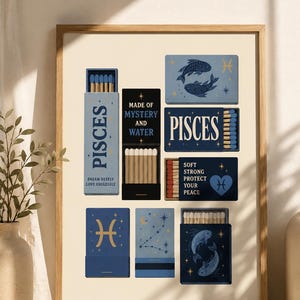 May include: A framed wall art print featuring a collection of matchboxes with Pisces zodiac themes. The design includes blue and black boxes with illustrations of fish, stars, and the text: PISCES, MADE OF MYSTERY AND WATER, and SOFT STRONG PROTECT YOUR PEACE.