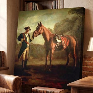 May include: A rectangular canvas print featuring an oil painting of a person in an 18th-century military uniform standing beside a brown horse. The person wears a dark blue coat, tan breeches, and a tricorn hat. The horse has a red saddle blanket.