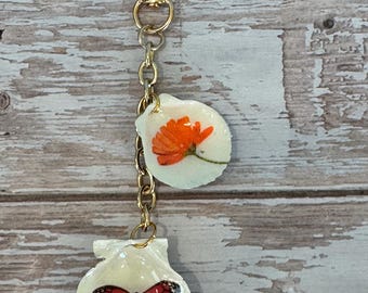Decoupage seashell keychain/purse jewelry, orange flower, red butterfly , gold chain.
