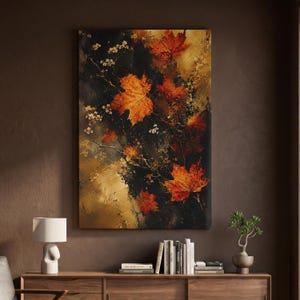 Peut inclure: Une impression murale rectangulaire présentant un fond sombre et mélancolique avec des feuilles d'érable orange et rouge vif dispersées. De fines branches délicates avec de petites fleurs blanches sont entremêlées au feuillage.