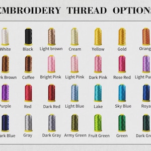 May include: A color chart titled EMBROIDERY THREAD OPTIONS displaying twenty-eight individual spools of thread in various colors. Each spool is labeled with its corresponding color name, including white, black, brown, pink, blue, green, and gray shades.