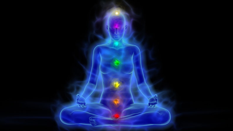 May include: A blue, translucent figure sits in a meditative pose with seven glowing chakras, representing energy centers, along the spine. The chakras are colored red, orange, yellow, green, blue, indigo, and violet.