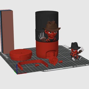 以下が含まれることがあります： 3Dプリントされた組み立てキット。赤と黒の円筒形容器、茶色の帽子と爪付きグローブを身に着けたキャラクターフィギュア、赤い蓋、ハンドル、そして黒い帽子と爪付きグローブを身に着けた小さなフィギュアが含まれています。