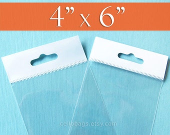 May include: Two clear cellophane bags with white header cards. The bags are 4" x 6" and have a hang hole. The bags are on a light blue background with an orange stripe at the top. The website cellobags.etsy.com is visible at the bottom.