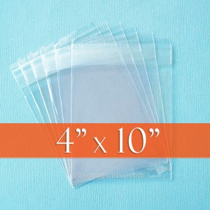 May include: Clear cellophane bags, measuring 4" x 10", are stacked on a light blue surface. The bags are transparent and have a sealed top. The text "4" x 10"" is displayed on an orange banner.