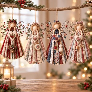 May include: Four hanging angel ornaments with wooden bead heads, wire wings, and fabric skirts made of vertical strips in red, white, blue, and green patterns. Each angel holds a heart-shaped ornament and features decorative sewing-themed accents.