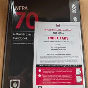 May include: The NFPA 70 National Electrical Code 2026 Edition handbook with a black cover featuring large red 70 text and a white NFPA logo, accompanied by a white instructional sheet for index tabs with red and black text and graphics.