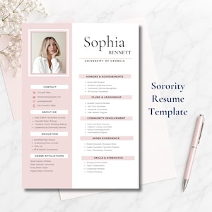 May include: A resume template featuring a soft pink sidebar with a placeholder photo of a person, contact details, education, and Greek affiliations. The white main section lists honors, clubs, community involvement, work experience, and skills.